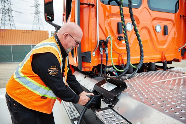 eCascadia_Driver_at_Charging_Station_MAY2023_01-630x420.jpg