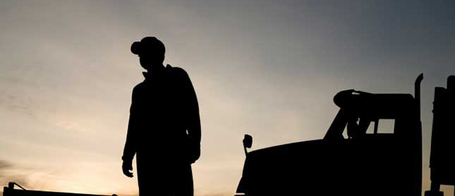 Driver and truck silhouette